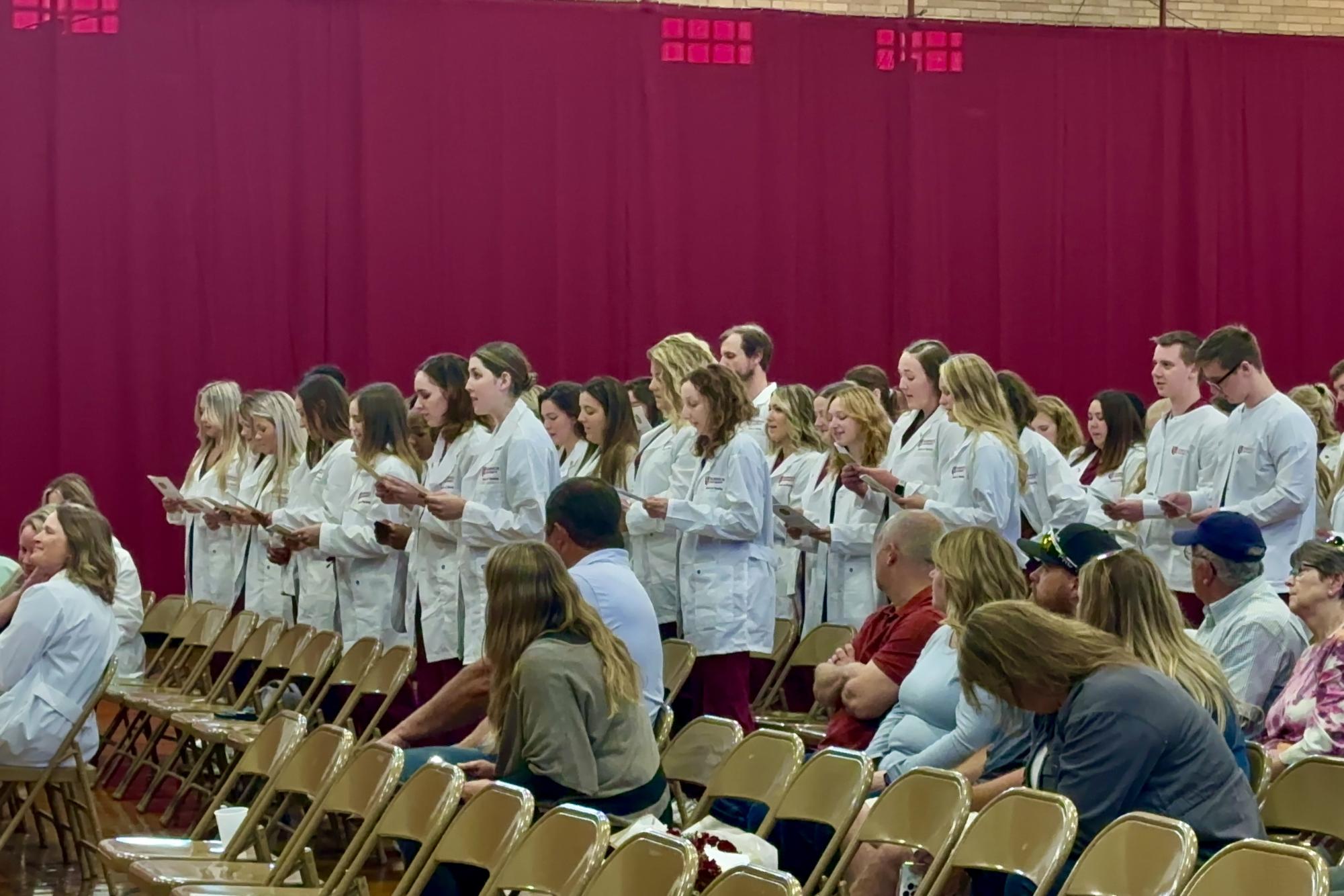 Class of 2025 nursing students receive their white coats – The Guidon