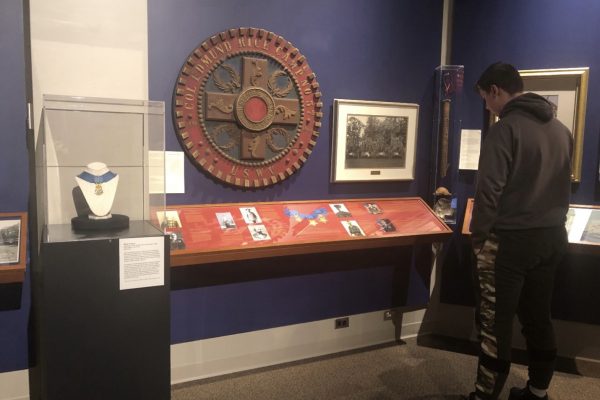 Norwich student Dimitry Mucha studies the Medal of Honor exhibit at the Sullivan Museum and History Center.