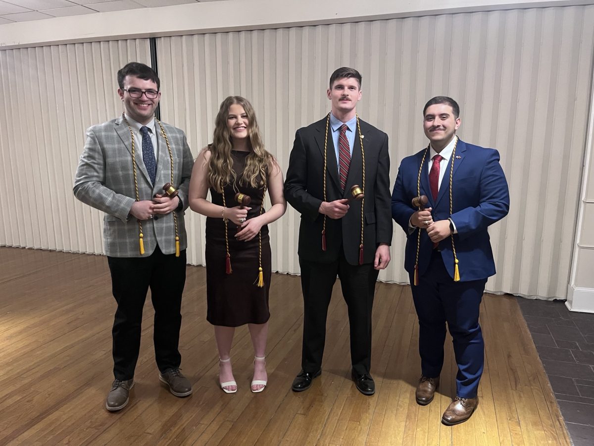 Taken at the 2026 SGA End of Year Banquet. Aponte (far right)